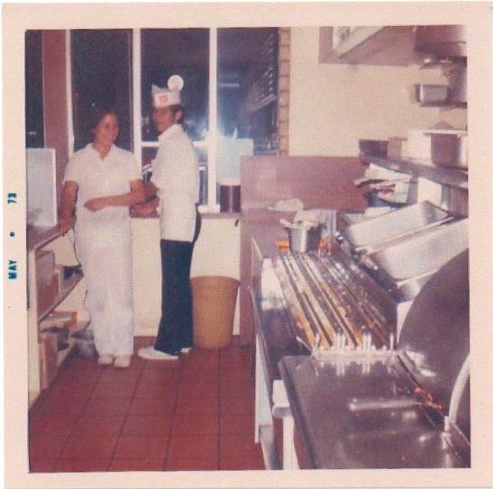 May 1973. El Taco employees Carolyn Florez and Alfonso Vicuña working the drive-thru window.