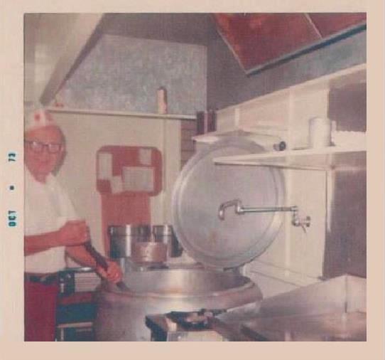 October 1973. Dad making refried beans at El Taco.
